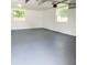 Spacious garage with freshly painted floor and ample storage at 210 W Illiana St, Orlando, FL 32806