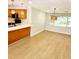 Spacious dining area with wood flooring and large windows at 210 W Illiana St, Orlando, FL 32806