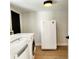 Laundry room includes washer, dryer and extra refrigerator at 210 W Illiana St, Orlando, FL 32806