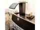 Modern bathroom faucet with waterfall design and sleek lines at 210 W Illiana St, Orlando, FL 32806