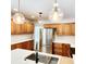 Modern kitchen with stainless steel appliances and quartz countertops at 210 W Illiana St, Orlando, FL 32806