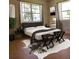 Primary bedroom with large window and hardwood floors at 210 W Illiana St, Orlando, FL 32806