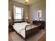 Bright bedroom with a king-size bed and modern decor at 210 W Illiana St, Orlando, FL 32806