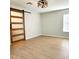 Room with a barn door and light hardwood floors at 210 W Illiana St, Orlando, FL 32806