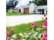 Newly paved driveway and landscaping enhance curb appeal at 210 W Illiana St, Orlando, FL 32806