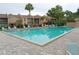 Sparkling community pool with surrounding patio furniture at 1019 Grove St # 85, Maitland, FL 32751