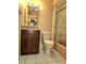 Bathroom with granite vanity, toilet and shower at 1019 Grove St # 85, Maitland, FL 32751