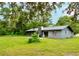 House with a large backyard and green grass at 1189 Rib Ave, Saint Cloud, FL 34771