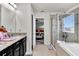Bathroom with granite countertops and large shower at 2720 Monticello Way, Kissimmee, FL 34741