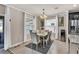 Elegant dining room with table for six and neutral decor at 2720 Monticello Way, Kissimmee, FL 34741