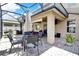 Outdoor patio with seating and dining areas at 2720 Monticello Way, Kissimmee, FL 34741