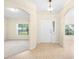 Bright entryway with tile flooring and views into adjacent rooms at 1955 Avenue D, Mulberry, FL 33860