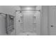 Clean shower with multiple built-in shelves at 2557 Shamrock St, Tavares, FL 32778
