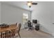Bedroom with desk setup and wooden table at 2557 Shamrock St, Tavares, FL 32778
