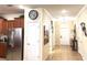 Bright and airy entryway with tile flooring and neutral colors at 1402 Wexford Way, Davenport, FL 33896