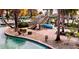 Relaxing lazy river with a waterslide for added fun at 1402 Wexford Way, Davenport, FL 33896