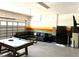 Finished garage converted into a game room with a pool table and seating at 1402 Wexford Way, Davenport, FL 33896