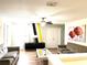 Bright living room with two sofas and a statement wall at 1402 Wexford Way, Davenport, FL 33896