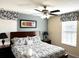 Spacious bedroom with a king-size bed and updated decor at 1402 Wexford Way, Davenport, FL 33896