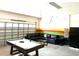 Finished garage converted into a game room with a pool table and seating at 1402 Wexford Way, Davenport, FL 33896