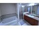 Bathroom boasts a relaxing jetted tub and a separate shower stall at 7395 Universal Blvd # 904, Orlando, FL 32819