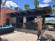 Relaxing pool bar with seating for residents and guests at 7395 Universal Blvd # 904, Orlando, FL 32819