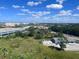 Aerial view of property showing surrounding buildings and landscape at 7395 Universal Blvd # 904, Orlando, FL 32819