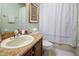 Clean bathroom with granite vanity and a bathtub at 3001 Calabria Ave, Davenport, FL 33897