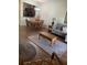 Open concept living and dining area with hardwood floors at 3001 Calabria Ave, Davenport, FL 33897