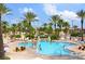 Community pool with ample deck space for lounging at 3001 Calabria Ave, Davenport, FL 33897