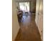 Bright hallway with wood-look tile flooring leading to living areas at 3001 Calabria Ave, Davenport, FL 33897
