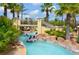 Relaxing lazy river with people enjoying inner tubes at 3001 Calabria Ave, Davenport, FL 33897