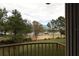 View from balcony features landscaping and a road at 5002 Tideview Cir # 3, Orlando, FL 32819