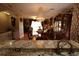 Elegant dining room with a chandelier and views to the living room at 5002 Tideview Cir # 3, Orlando, FL 32819