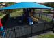 Community playground with shaded play structure and safety surface at 5002 Tideview Cir # 3, Orlando, FL 32819