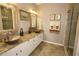 Bathroom boasts double sinks, granite counters, and a large shower at 5002 Tideview Cir # 3, Orlando, FL 32819