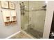 Large walk-in shower with glass enclosure and built-in shelving at 5002 Tideview Cir # 3, Orlando, FL 32819