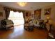 Living room features hardwood floors and comfortable seating at 5002 Tideview Cir # 3, Orlando, FL 32819