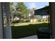 Private patio with table and chairs, overlooking the lawn at 5002 Tideview Cir # 3, Orlando, FL 32819