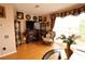 Living room with hardwood floors, fireplace, and built-in shelving at 5002 Tideview Cir # 3, Orlando, FL 32819