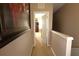 Hallway with carpet and a door leading to a bedroom at 5002 Tideview Cir # 3, Orlando, FL 32819