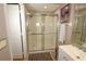 Clean bathroom with a walk-in shower and updated vanity at 5002 Tideview Cir # 3, Orlando, FL 32819