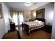 Bright bedroom with a queen bed and access to a balcony at 5002 Tideview Cir # 3, Orlando, FL 32819