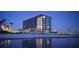 Oceanside Inn beachfront hotel at night, reflecting in the water at 1909 S Atlantic Ave # 901, Daytona Beach, FL 32118