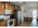 Bright kitchen with stainless steel appliances at 7878 Tanbier Dr, Orlando, FL 32818