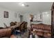 Open concept living area with dining and kitchen views at 7878 Tanbier Dr, Orlando, FL 32818