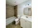 Updated bathroom with white vanity, new bathtub, and modern fixtures at 9115 Se 88Th St, Ocala, FL 34472