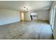 Open dining area with tile floor and access to kitchen at 9115 Se 88Th St, Ocala, FL 34472