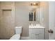 Clean bathroom with white vanity and tile shower at 13 E 8Th St, Frostproof, FL 33843