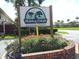 Community entrance sign for Hidden Creek Luxury Townhomes at 6274 Whispering Way # 130, Orlando, FL 32807